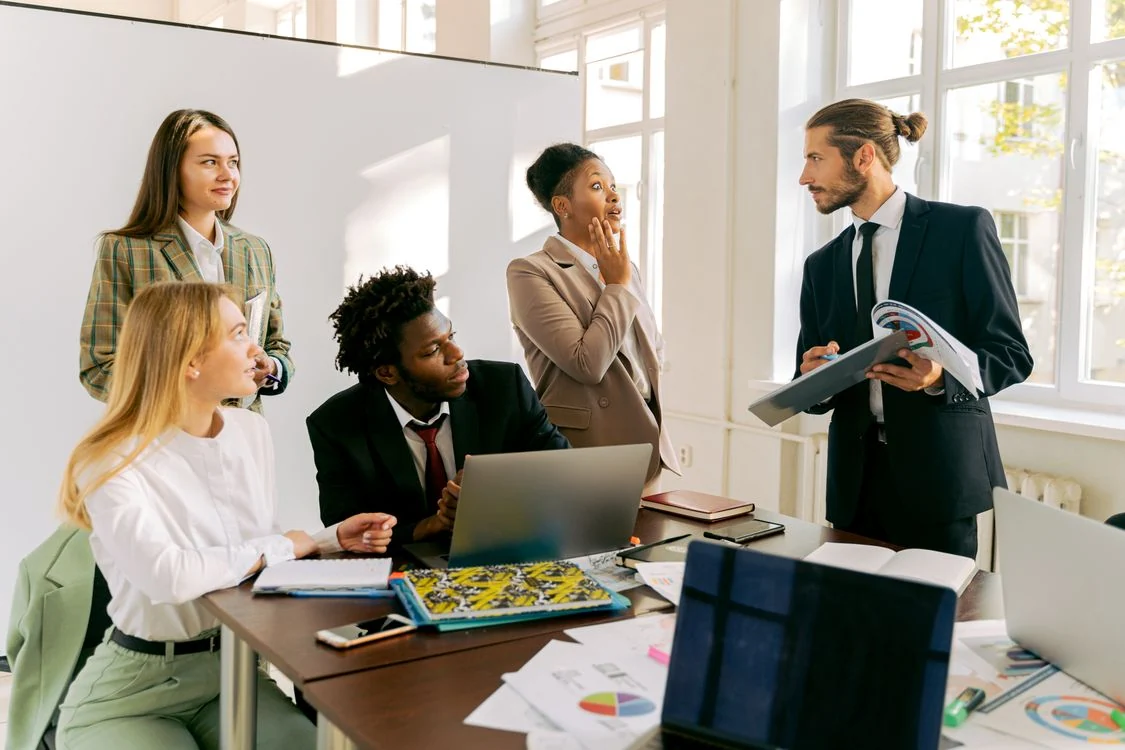 Illustrative diverse professionals collaborating on a business discussion